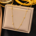 Collar de cadena de cuentas redondas dorado