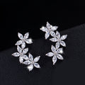 Aretes para mujer en plata con diseño de flores (Plata)