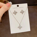 Set de collar y aretes de flor con circonita