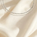 Collar doble cadena con brillos, acero inoxidable 316 plateado