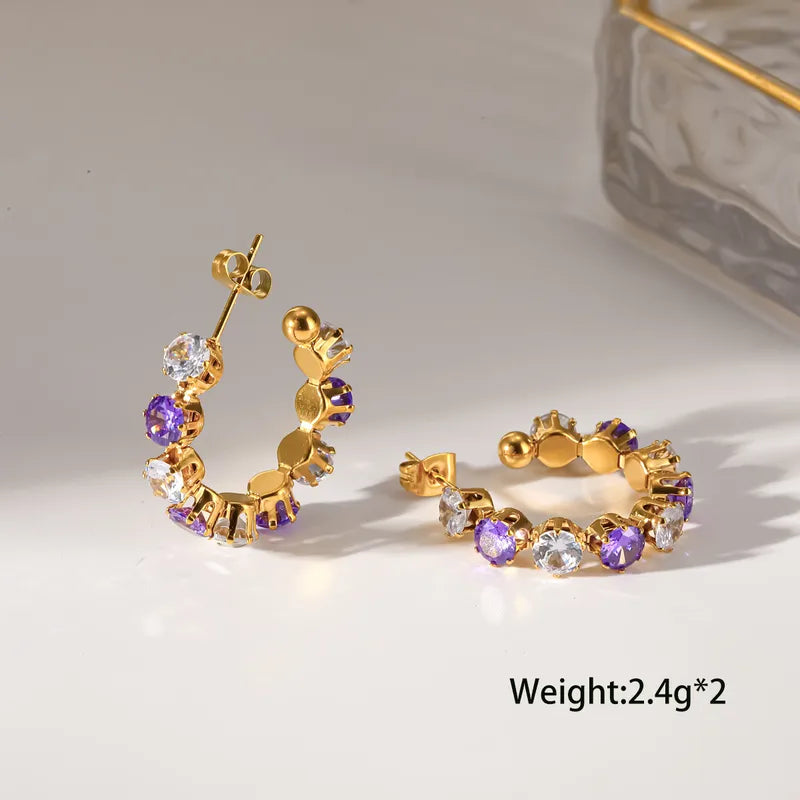 Aretes media argolla con circones morados y blancos, acero 304 dorado