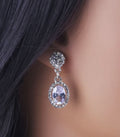 Aretes colgantes redondos en Plata